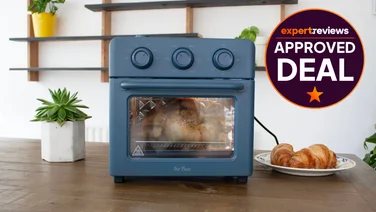 The Our Place Wonder Oven on a tabletop. A roundel badge reads "Expert Reviews Approved Deal"